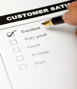 Business values - satisfied customers concept with a survey form